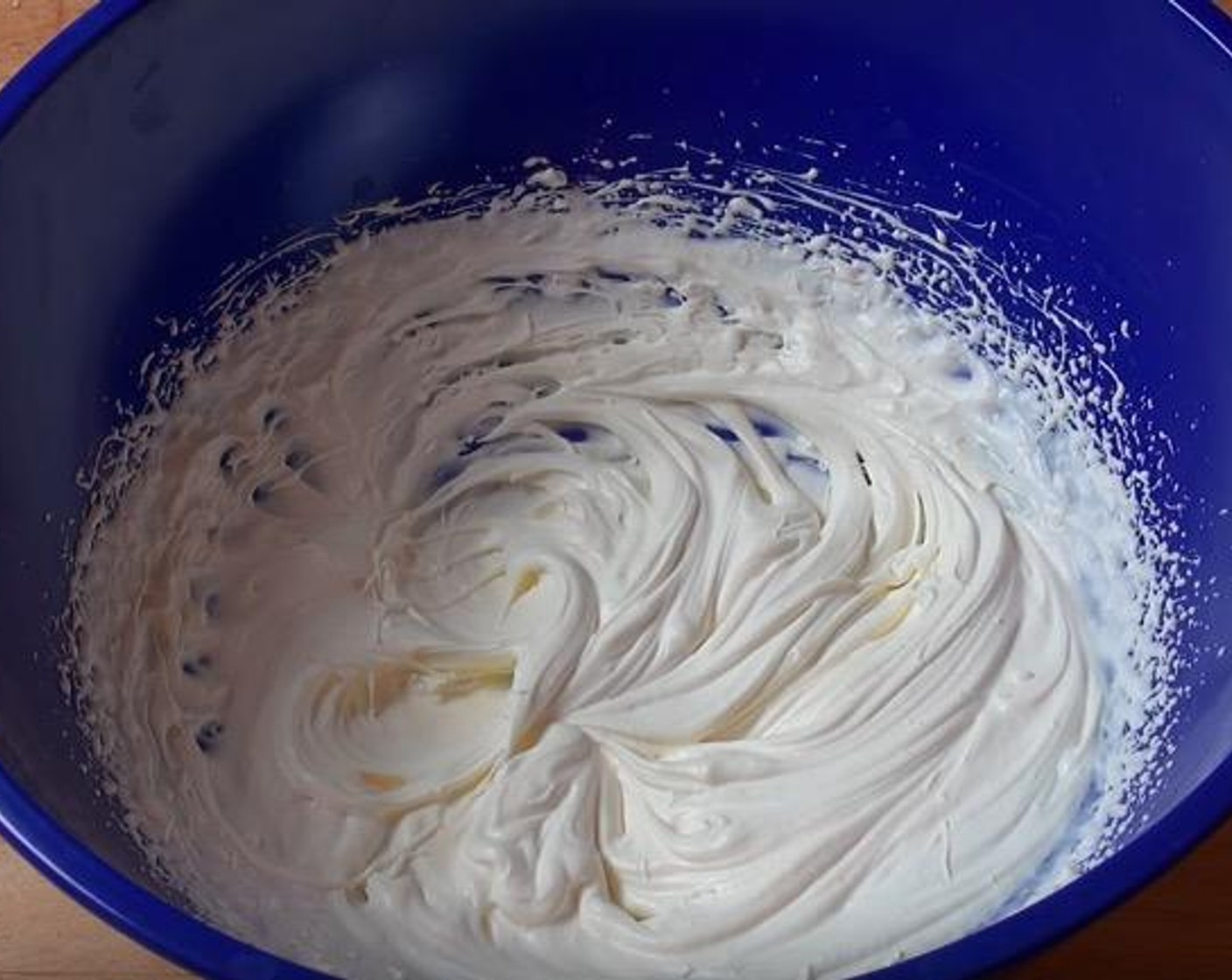 step 5 In a large mixing bowl, beat Kemps Heavy Whipping Cream (3/4 cup) until it forms soft peaks.