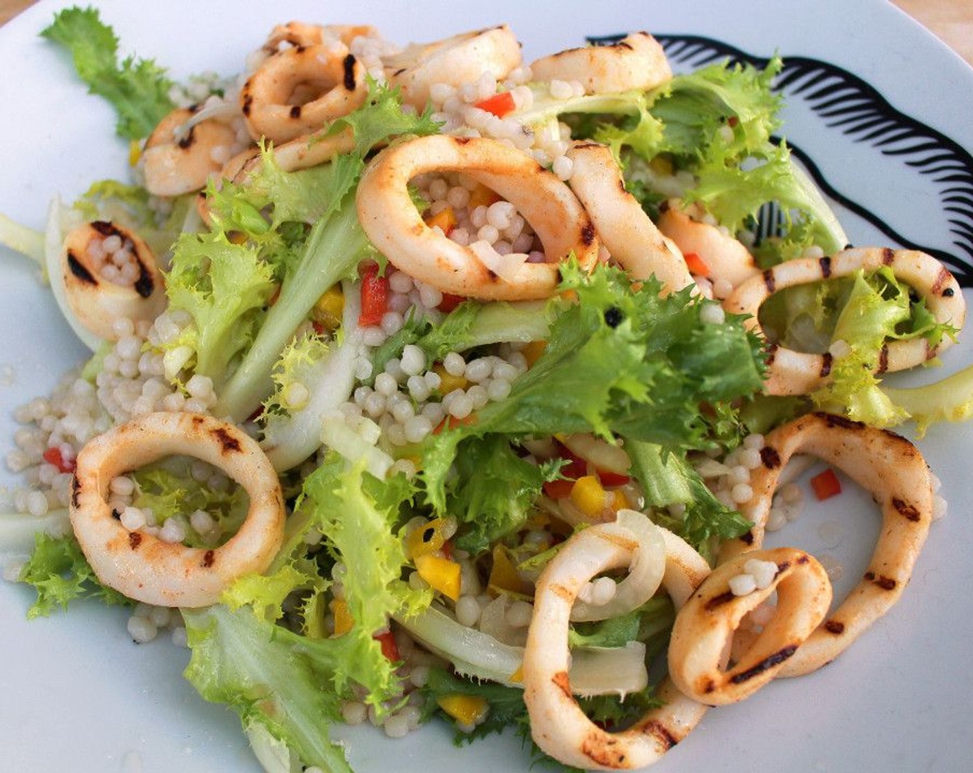 step 7 Plate the salad, then top with the remaining squid rings.