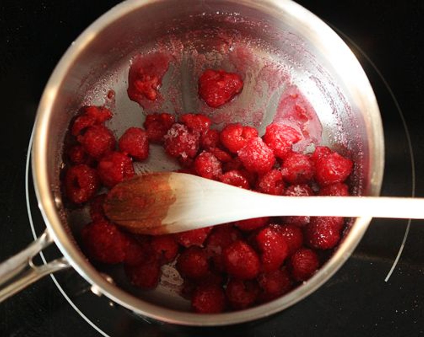 step 11 Combine Fresh Raspberries (1 1/3 cups) and Granulated Sugar (1/4 cup) in a small saucepan over medium-high heat. Bring to a boil and cook for 8-10 minutes, stirring often to break down the berries.