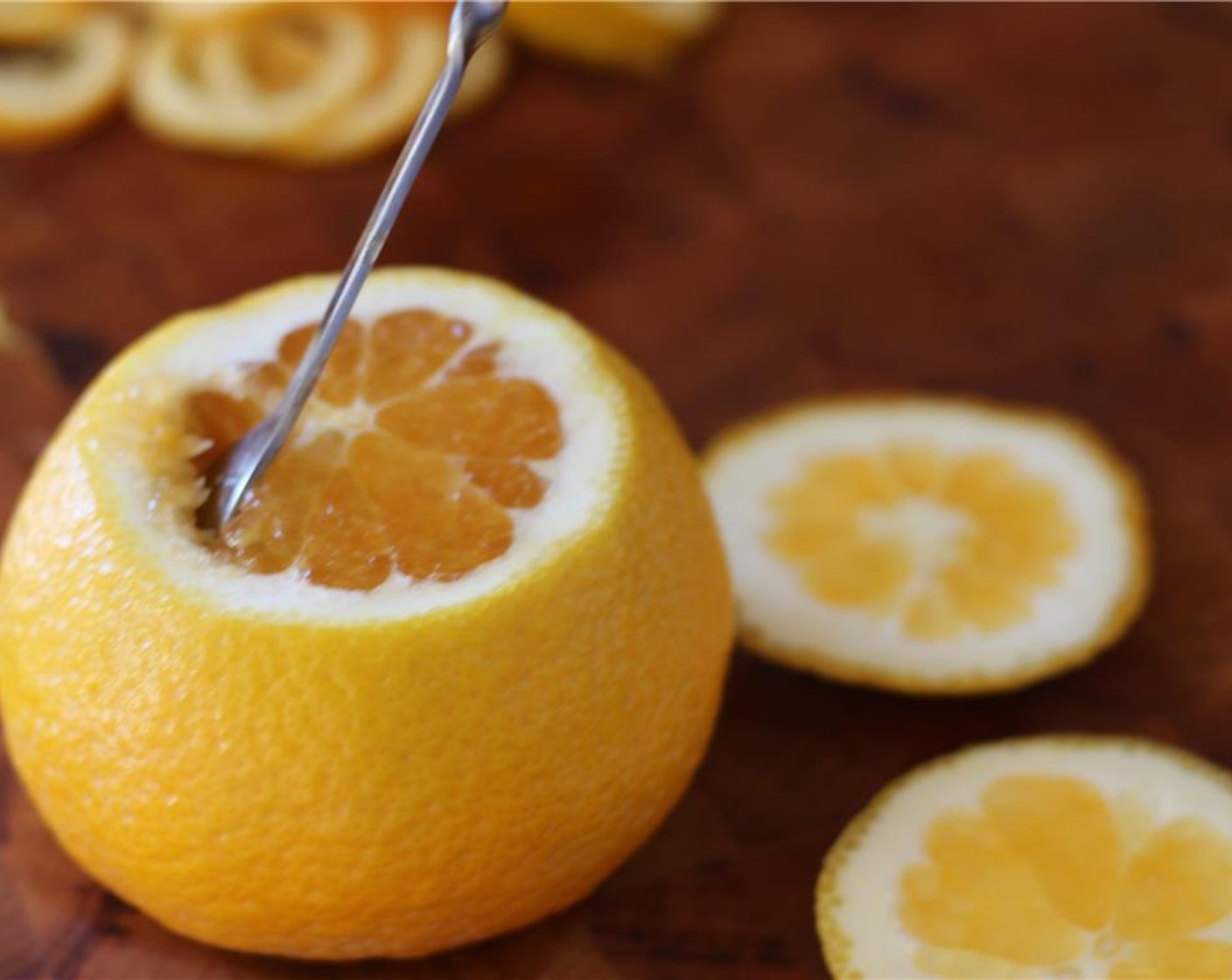 step 1 Slice the tops and bottoms off the Oranges (2).