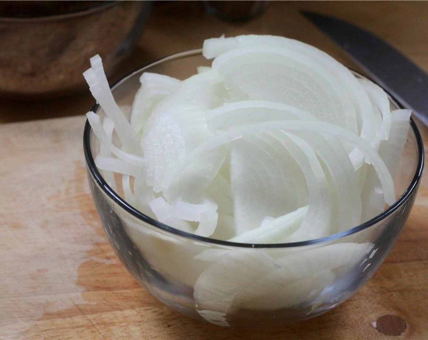 step 1 Preheat oven to 350 degrees F (180 degrees C). Slice the Onion (1).
