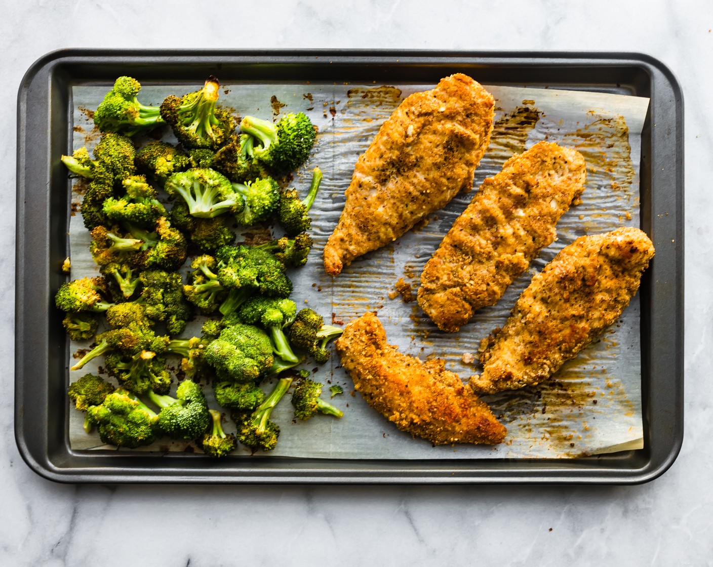 step 9 Bake for 15 minutes on one side, then remove the pan from the oven and transfer cooked vegetables to a large bowl or plate. Cover with aluminum foil to keep them warm.