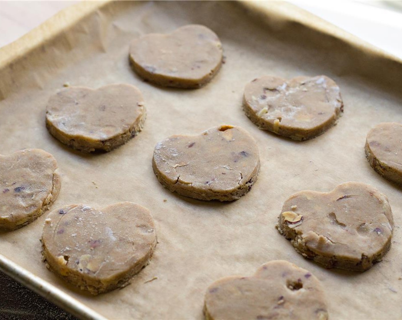 step 9 Place the cookies on the prepared baking sheets at least an inch apart from another.