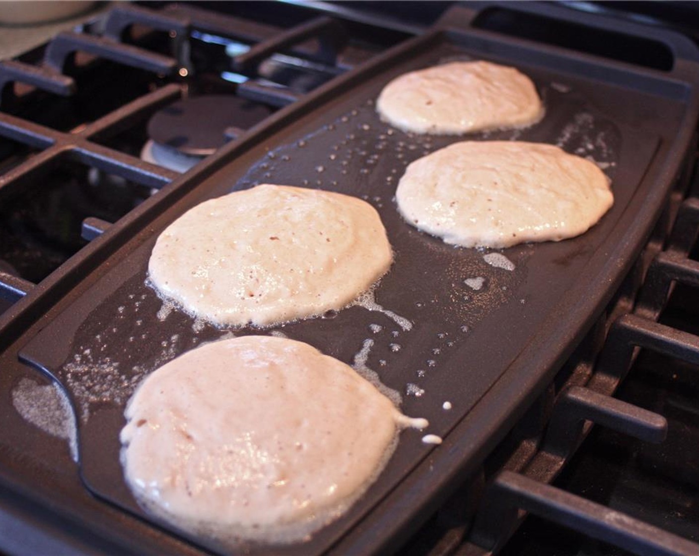 step 10 Drop a ¼ cup of batter per pancake onto the griddle.