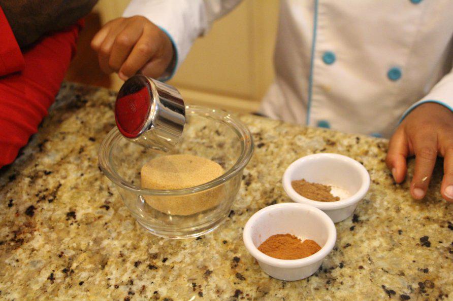Step 4 of Apple Pie Bites Recipe: In a separate small bowl, mix the Brown Sugar (1/3 cup), Ground Nutmeg (1 teaspoon), and Ground Cinnamon (1 teaspoon).