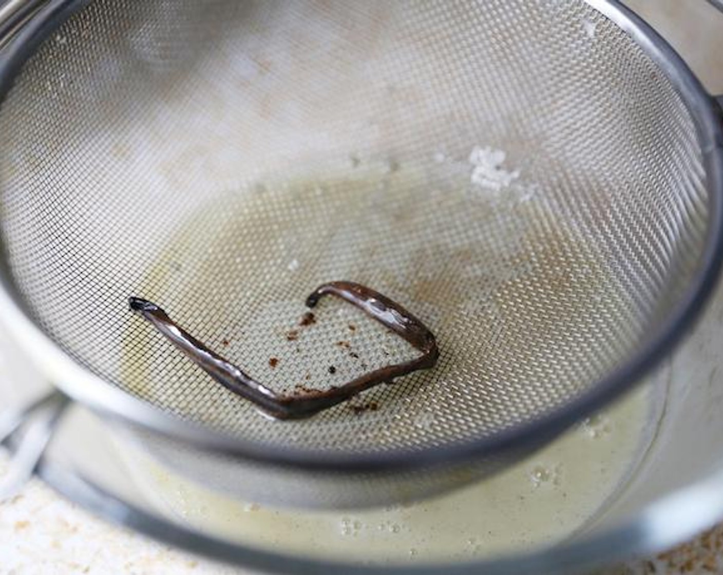 step 4 Remove from the heat and strain into a bowl.