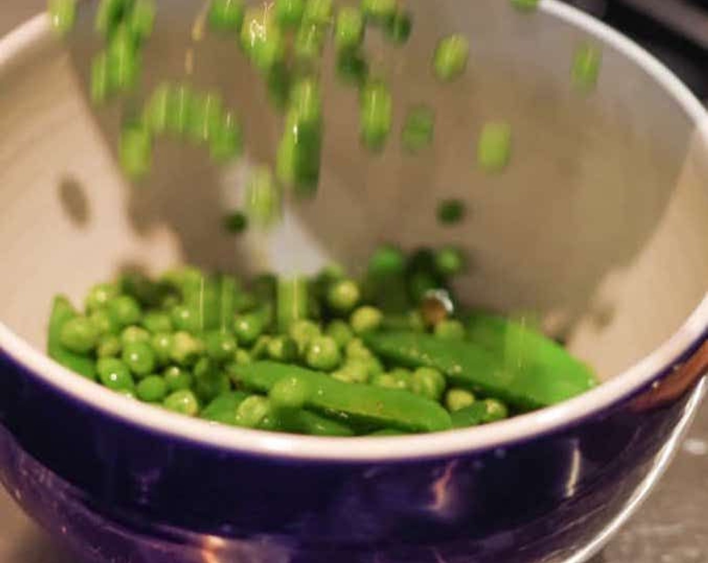 step 3 Stir in the Frozen Green Peas (3 1/3 cups) and cook while stirring for 3 minutes more. Transfer to a bowl and set aside.