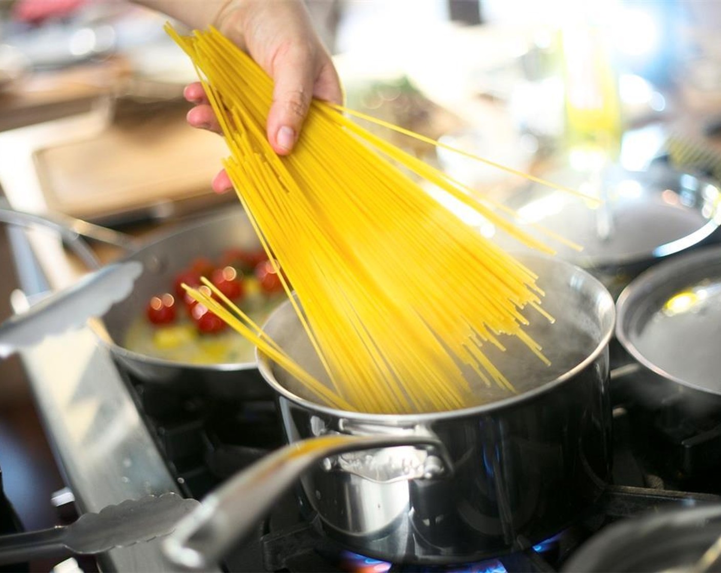 step 8 Once water is at a full boil, add Spaghetti (8 oz) and cook for eight minutes.