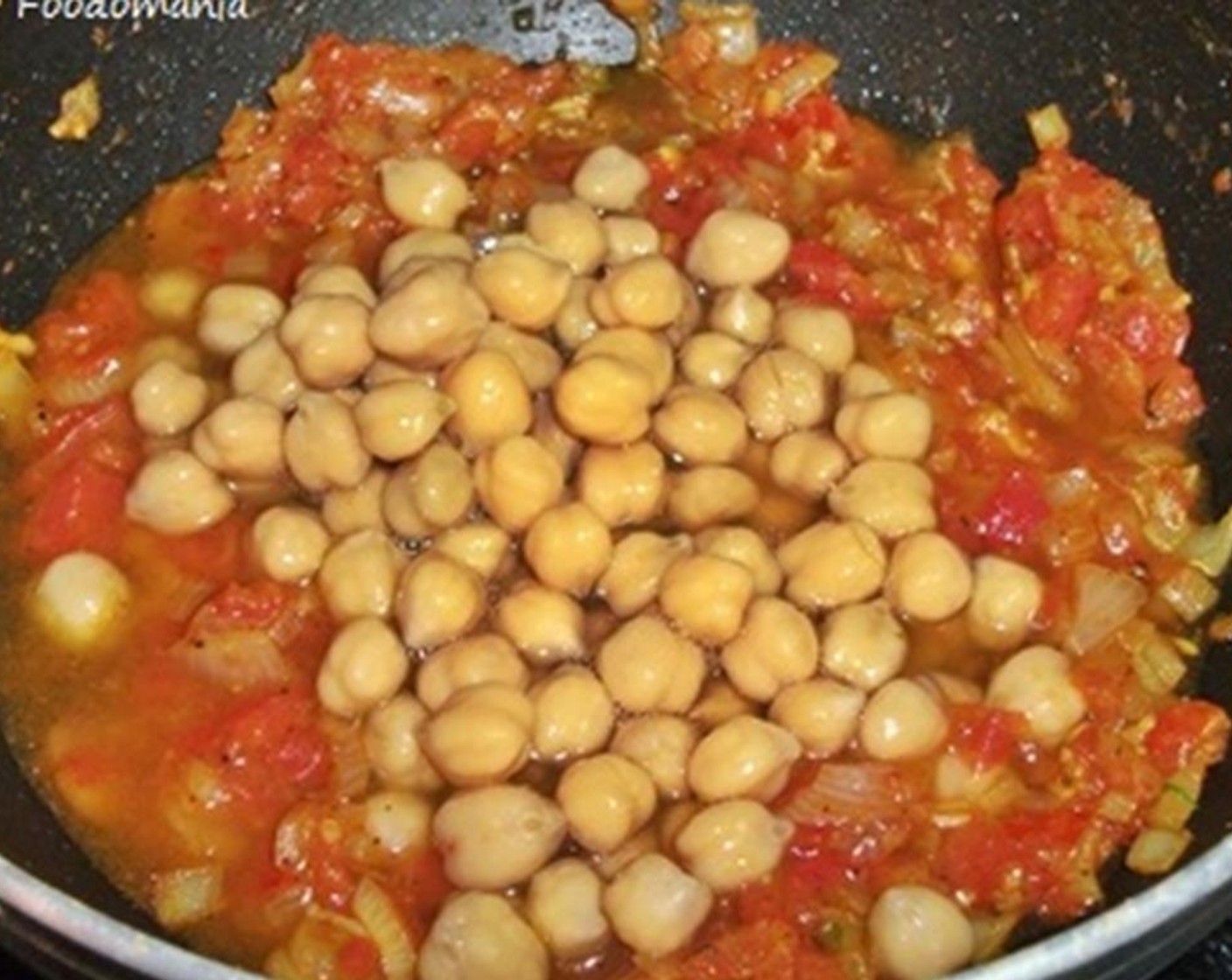 step 3 Add the Tomato (2/3 cup), Salt (1 tsp), Ground Black Pepper (1/2 tsp), Sweet Paprika (1/4 tsp), and Ground Turmeric (1/4 tsp) to the soup pot and simmer 30-45 minutes or until the chickpea are soft.