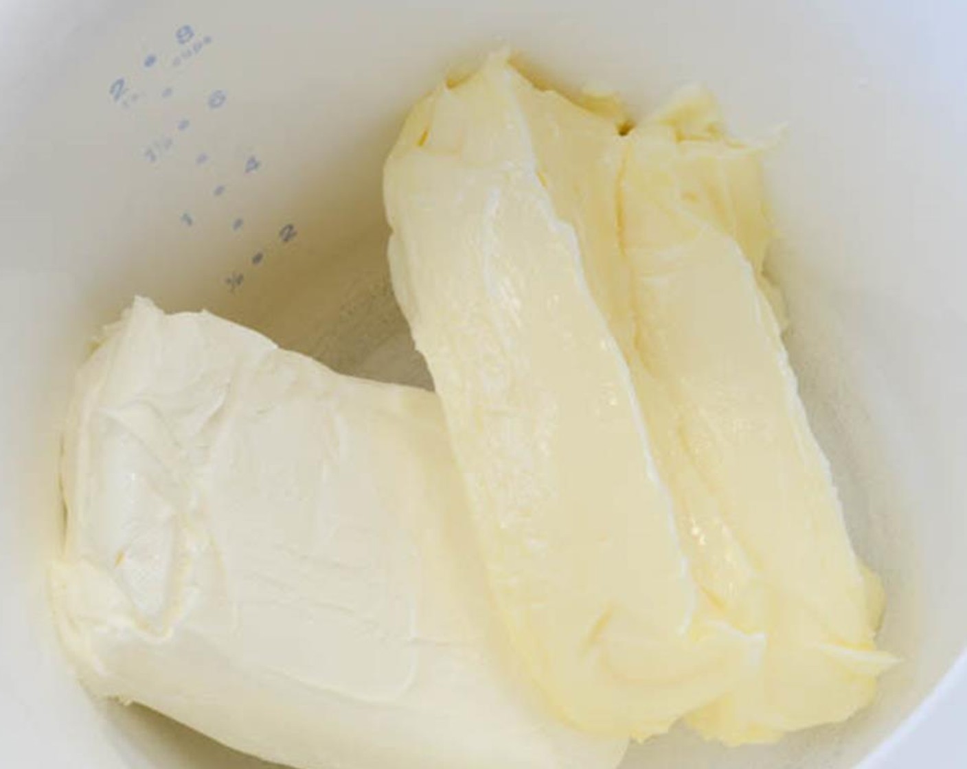 step 8 In a large bowl, combine the Philadelphia Original Soft Cheese (1 cup) and Unsalted Butter (1 cup). Mix on medium high speed with a hand mixer until well combined.