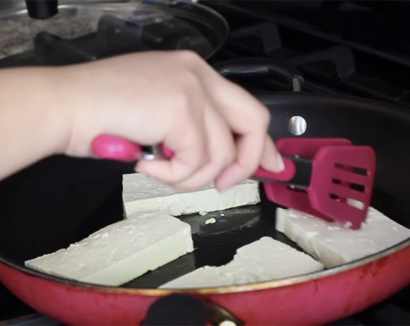 step 8 In a large pan or wok over medium-high heat, heat a little Canola Oil (as needed) then fry tofu until golden brown and slightly crispy.