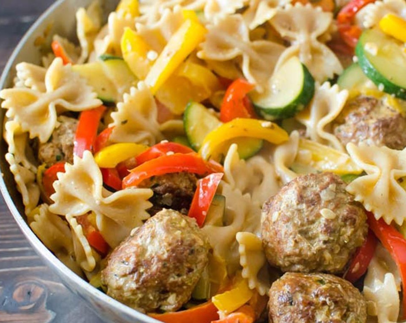 step 6 Add the meatballs and cooked Farfalle. Reduce heat to a simmer and place a tight fitting lid on the pan. Cook for an additional 1-2 minutes. Remove from heat and check for seasonings, adding Salt (to taste) and Ground Black Pepper (to taste) if desired.