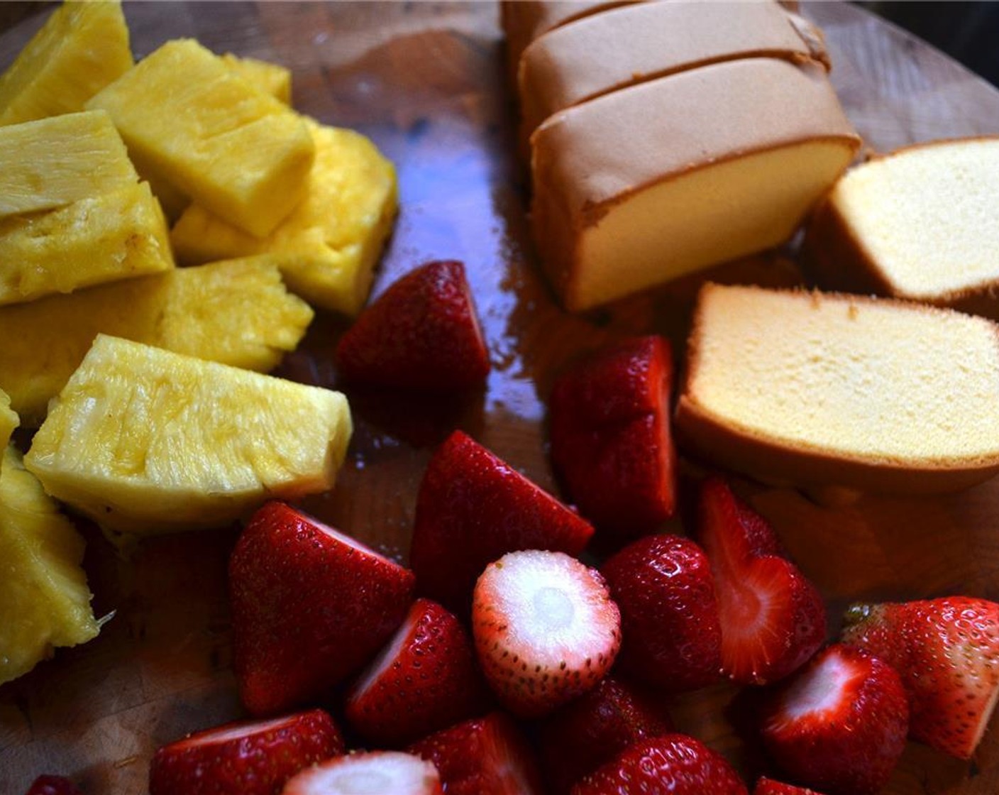 step 1 Preheat the grill and grate to medium-high heat. Chop the Fresh Strawberries (2 cups) and Pineapples (2 cups) into even-sized pieces and add to the skewers (8-10). Slice the Pound Cake (1) as desired.