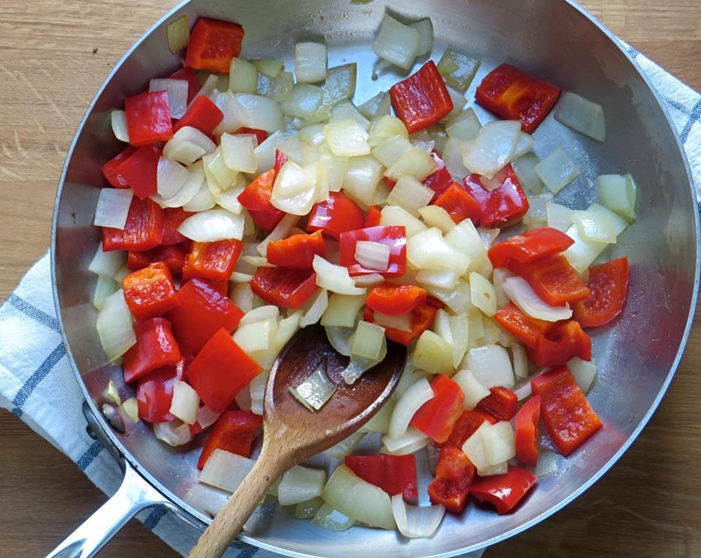 step 4 Add the red bell pepper and continue cooking another 2 to 3 minutes.