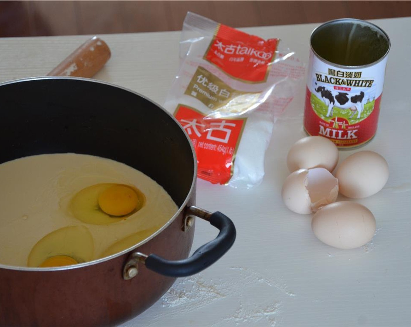 step 4 In a large pot, mix together the Salt (1 pinch), Eggs (4), Granulated Sugar (1/2 cup), and Evaporated Milk (1 1/2 cups).