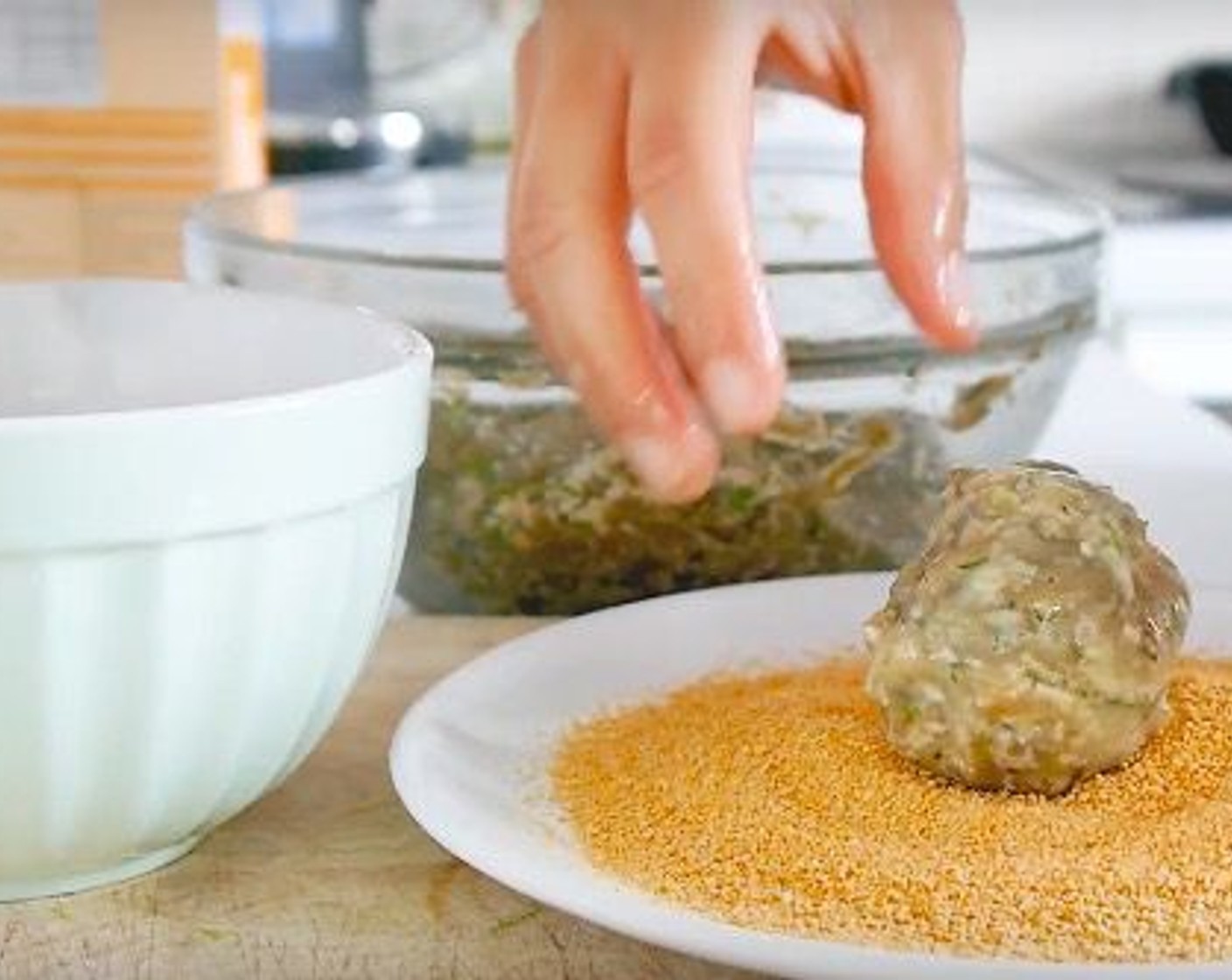 step 8 Dredge each ball in the egg and then cover in breadcrumbs. Once all the balls have been breaded, fry in hot Vegetable Oil (as needed) until golden brown, this can take around 10 minutes altogether.