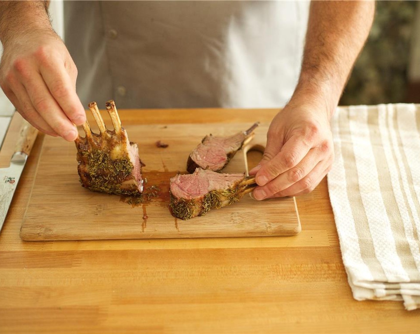 step 16 Carefully slice the lamb along every two bones to create four two bone chops.