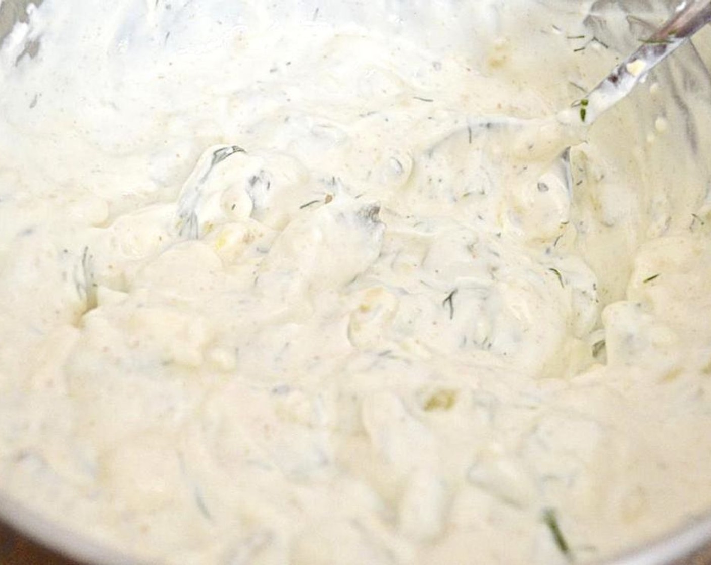 step 1 Simply combine Plain Greek Yogurt (1 2/3 cups), Cream Cheese (1/2 cup), Dill Pickle (1 cup), Fresh Dill (1/4 cup), Pickle Juice (1 Tbsp), McCormick® Garlic Powder (1 tsp), Dried Onions (1 tsp), Ground Cumin (1/2 tsp), Salt (1 pinch), and Ground Black Pepper (1 pinch) in a bowl and stir it together well.