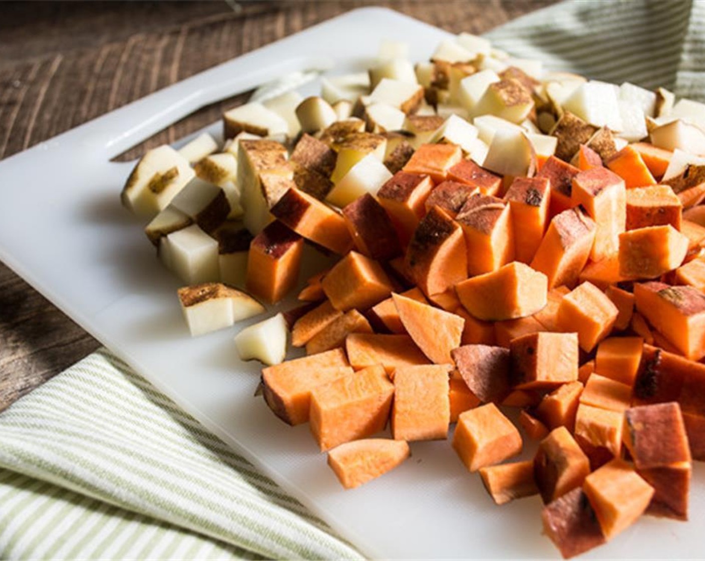 step 2 Add Sweet Potato (1), Russet Potato (1), Red Bell Pepper (1), and Red Onion (1/2) in a large bowl.