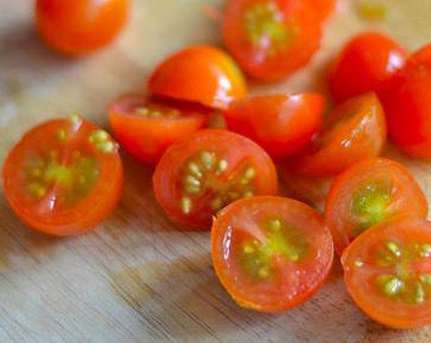 step 2 Cut tomatoes in half.