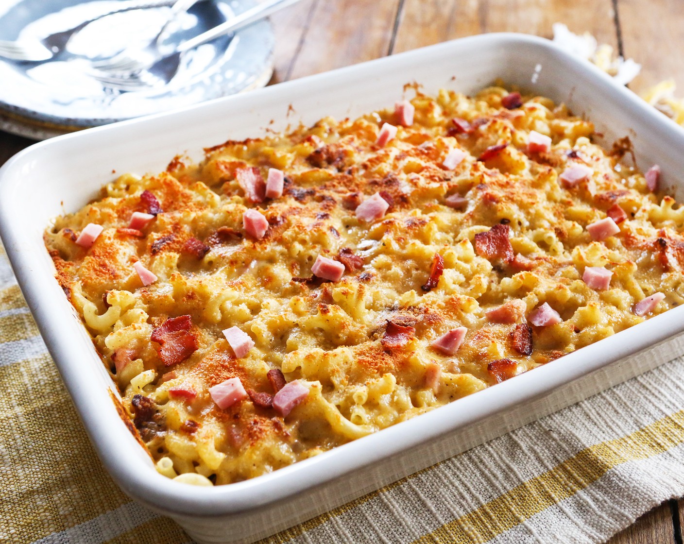 step 9 Bake uncovered in the preheated oven for 20 minutes or until cheese is lightly golden brown around the edges.