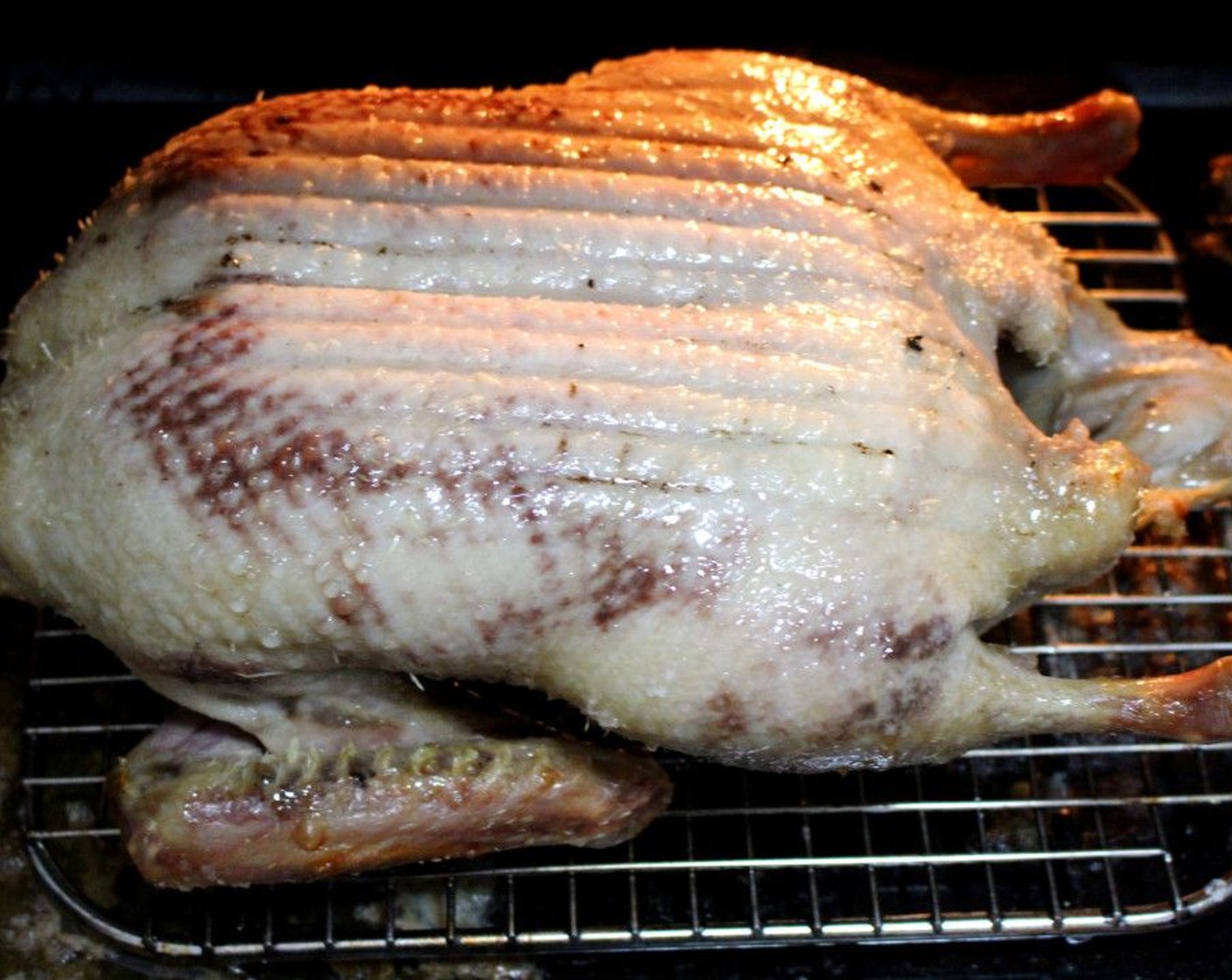 step 4 After 3 Hours and 45 Minutes, turn the temperature to 425 degrees F (220 degrees C) remove the duck with the rack, and place it on another tray (I used a cast iron pan). Roast breast-side up for another 20 to 30 minutes or until the skin is very crisp and golden brown.