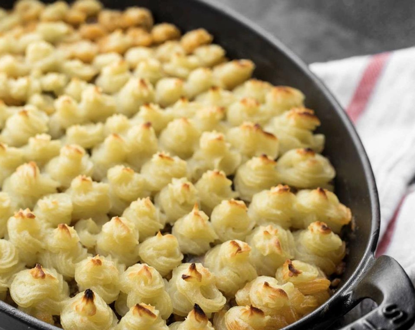 step 13 Remove Shepherd's Pie from oven and let cool 10-15 minutes before serving. Enjoy!