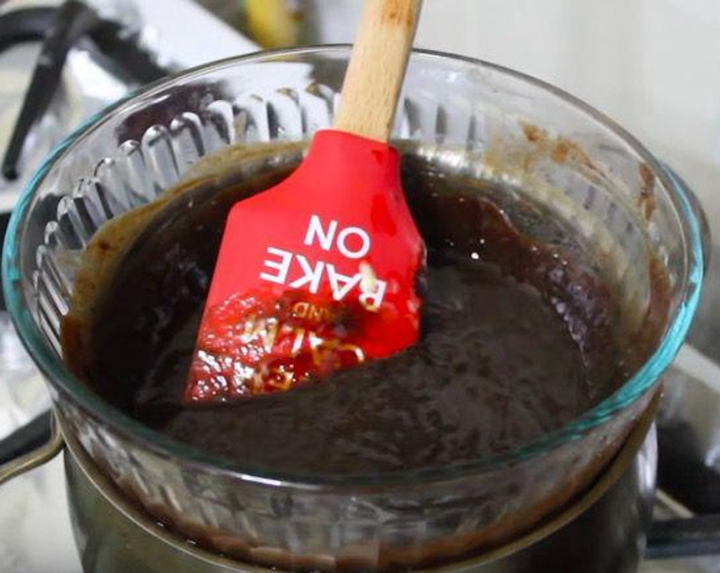 step 1 Over a double boiler, melt Butter (1/2 cup) and Semi-Sweet Chocolate Chips (1 1/3 cups). Add Granulated Sugar (3/4 cup) and Brown Sugar (1/4 cup). Remove from heat and set aside to cool completely.