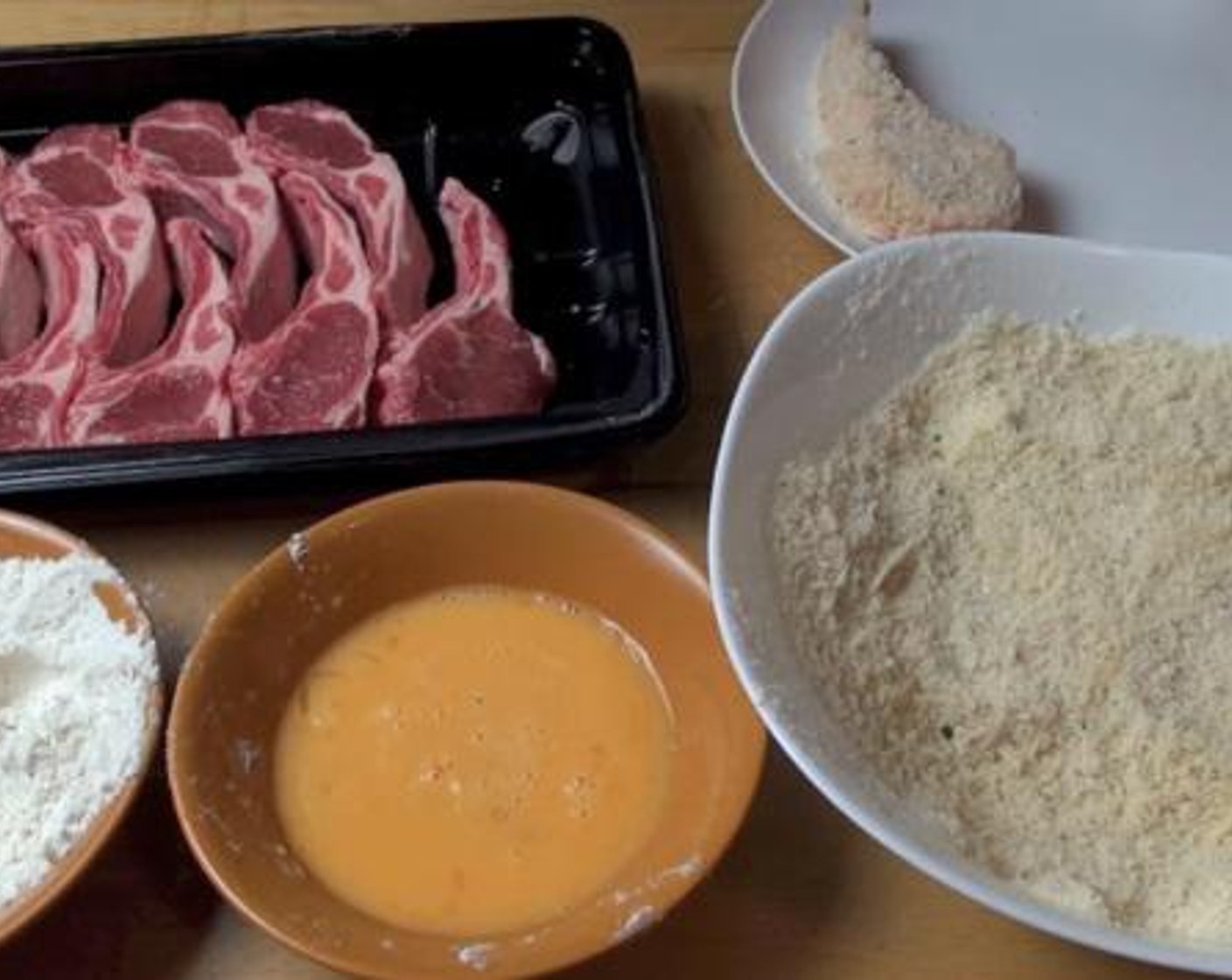 step 3 Take each Lamb Chops (2.2 lb) and put it in the Flour making sure it's coated well. Dip it in the Eggs (2) and rub it with the breadcrumb mix. Continue with the rest of the lamb cutlets, and put them on a plate.