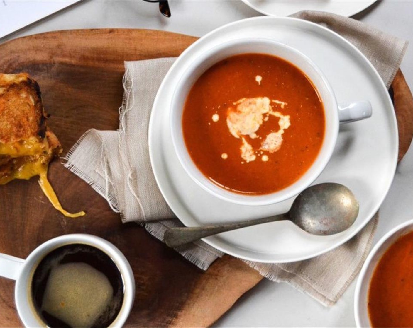 step 8 Serve tomato soup with a twirl of Fresh Cream (to taste) and a spoon of Basil Pesto (to taste) along with the tomato paste.