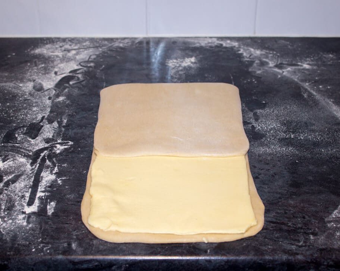 step 8 Fold the top third over so it overlaps half of the butter.