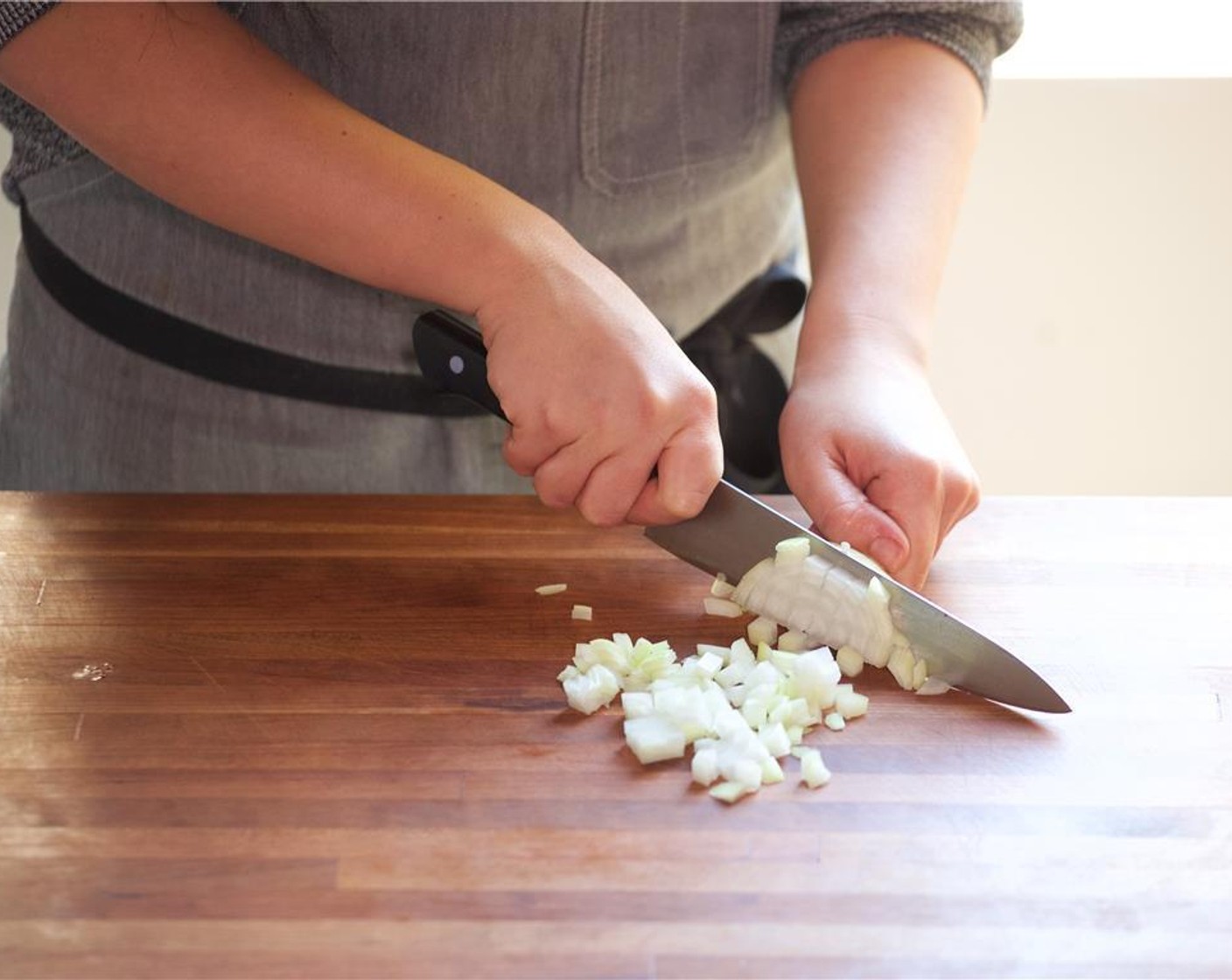 step 6 In a second small bowl, mix together one cup of water and Chicken Base (1 pckg), and set aside.