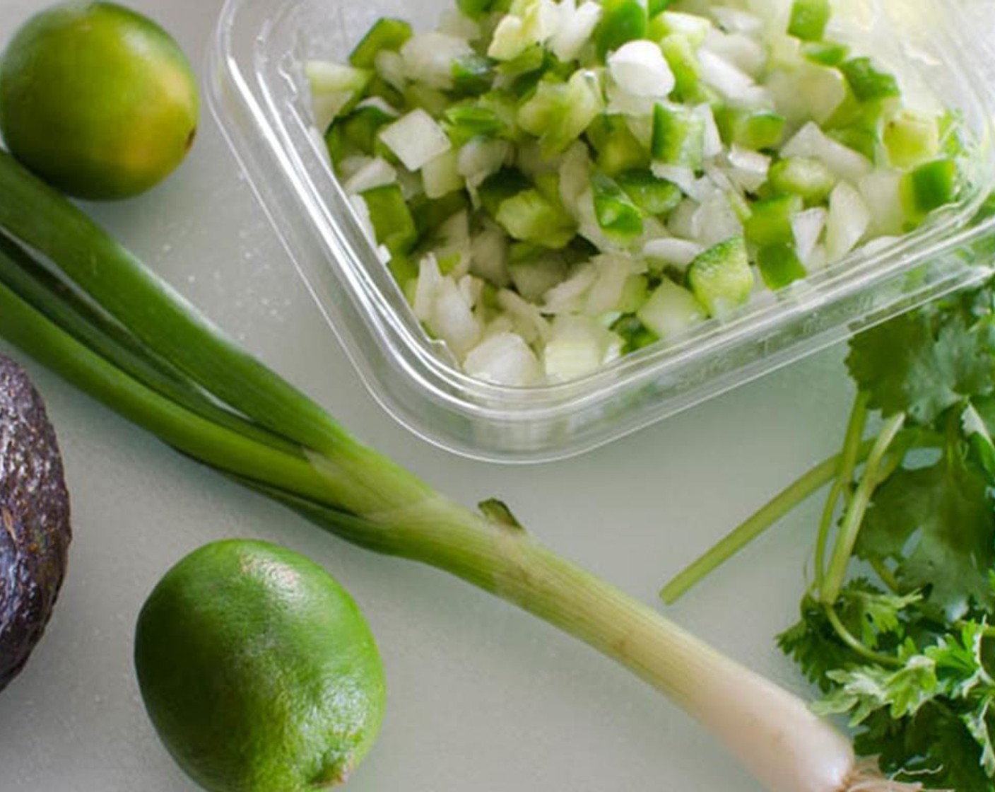 step 4 Slice the Avocado (1) into wedges, chop Fresh Cilantro (to taste) and slice Limes (to taste) into wedges.