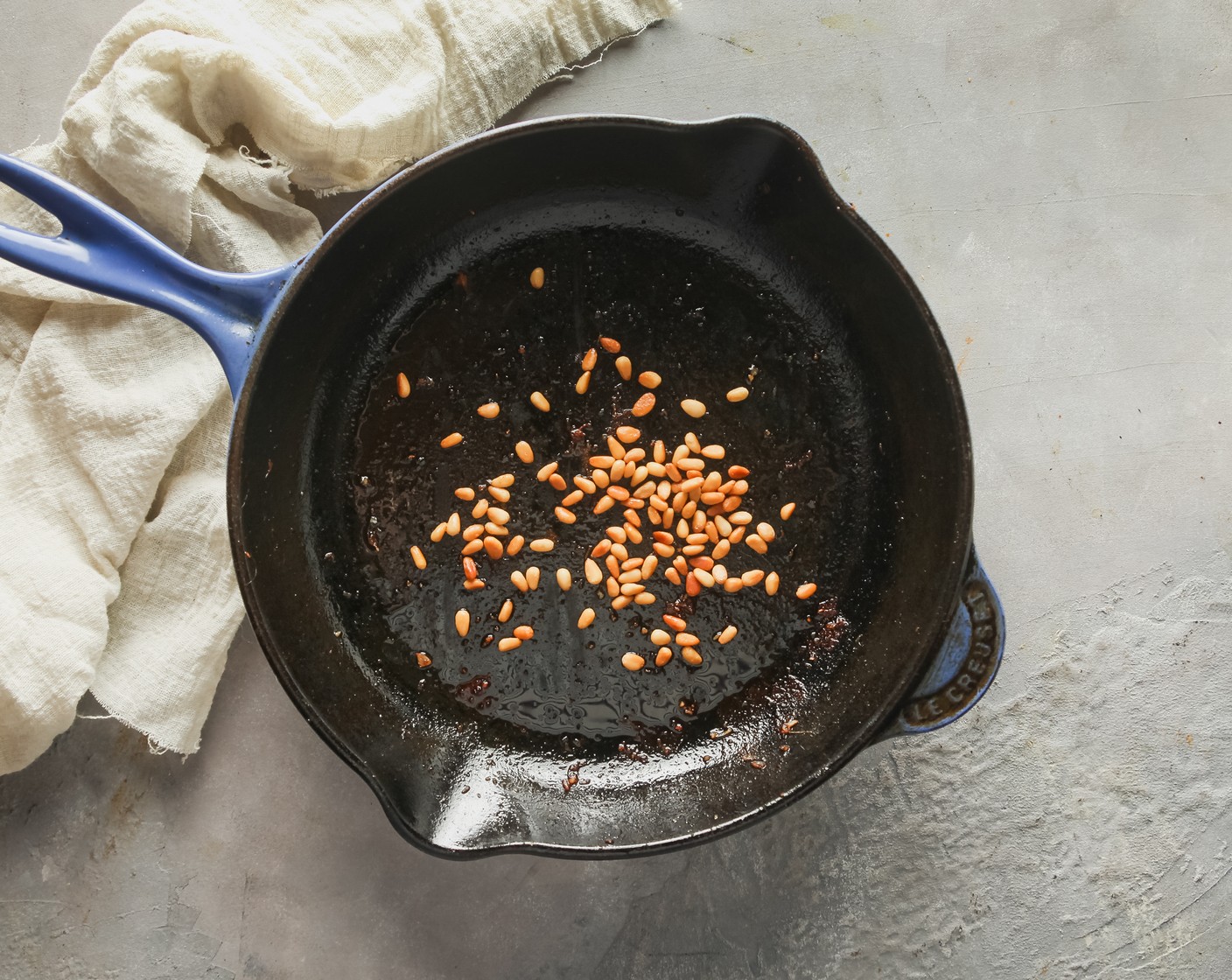 step 2 While the water is boiling, heat the Vegetable Oil (2 Tbsp) in a medium skillet over low heat. When the oil is shimmering, add the Pine Nuts (2 Tbsp) and cook for 2-3 minutes, until golden brown and toasted. Transfer to a papertowel-lined plate.