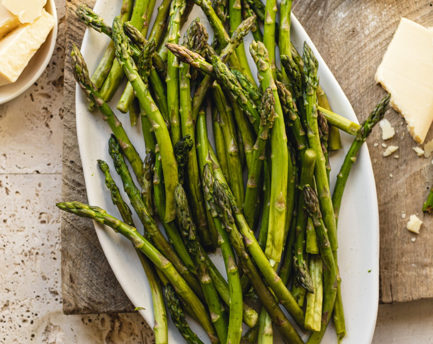 step 7 Arrange Asparagus (1 bunch) spears as you please, have fun, and get creative. Just stay within the scored border.