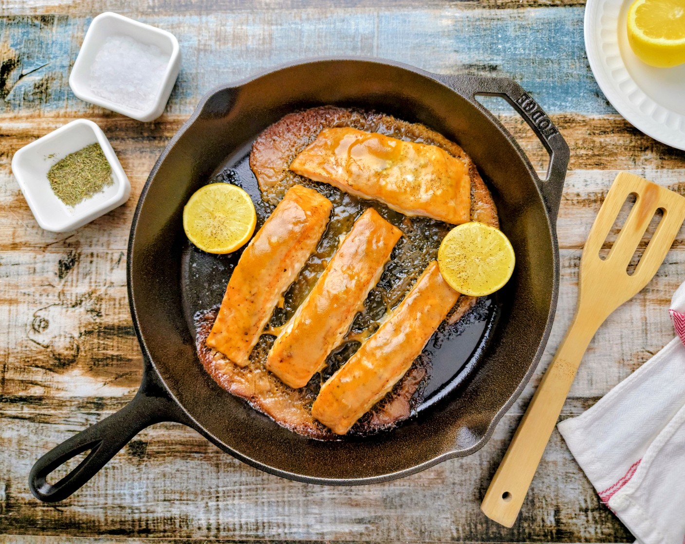 step 7 After 5 minutes, place the pan of salmon in the oven on the top rack and roast for 15 minutes.