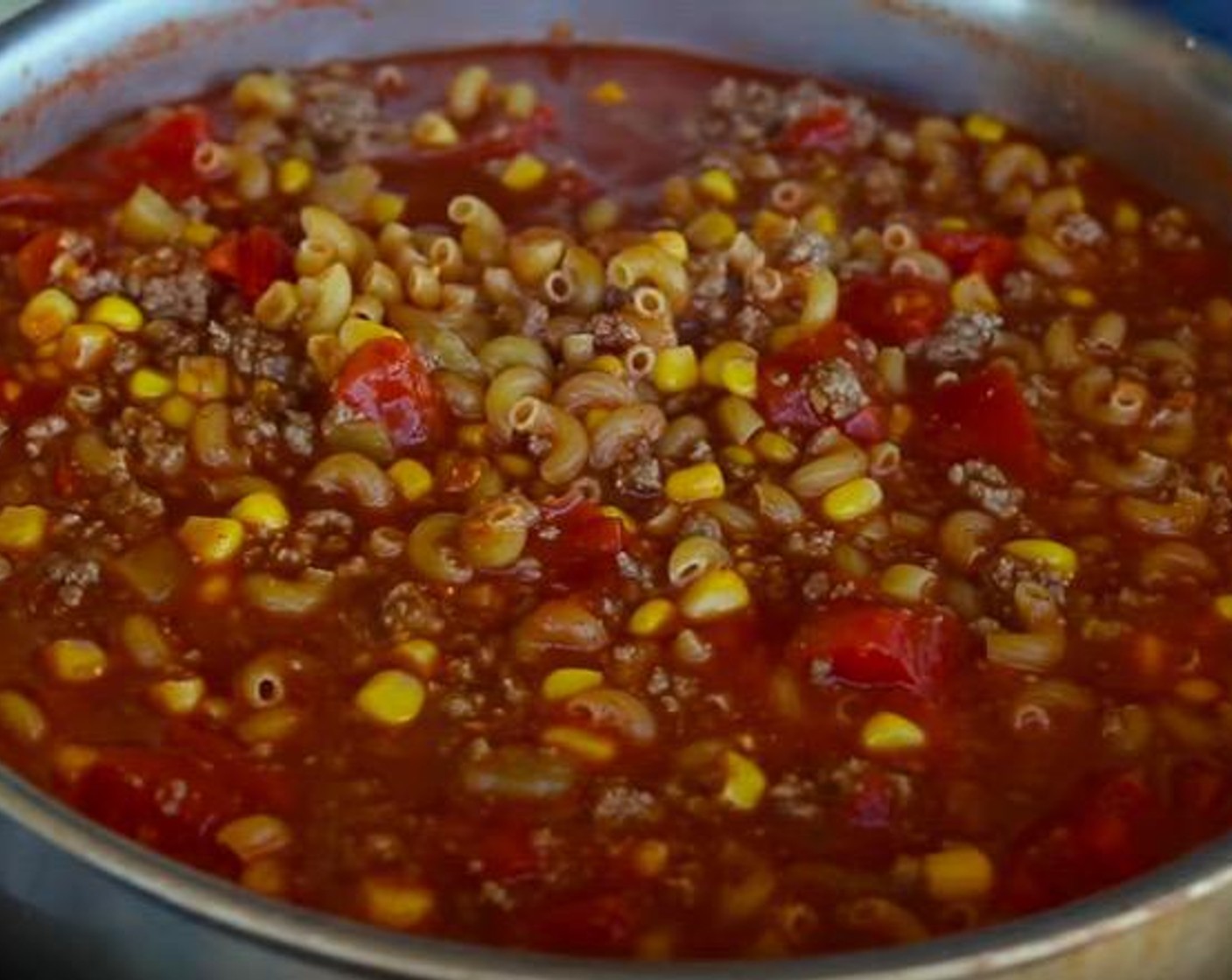 step 3 Add Elbow Macaroni (2 cups), stir, reduce heat to low. Cover and simmer for 15-20 minutes or until pasta is cooked. Stir occasionally.