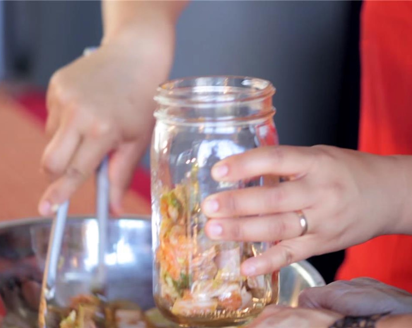 step 5 Pack everything, including the liquid that has leached out from the cabbage, into a quart-sized, wide mouth mason jar.