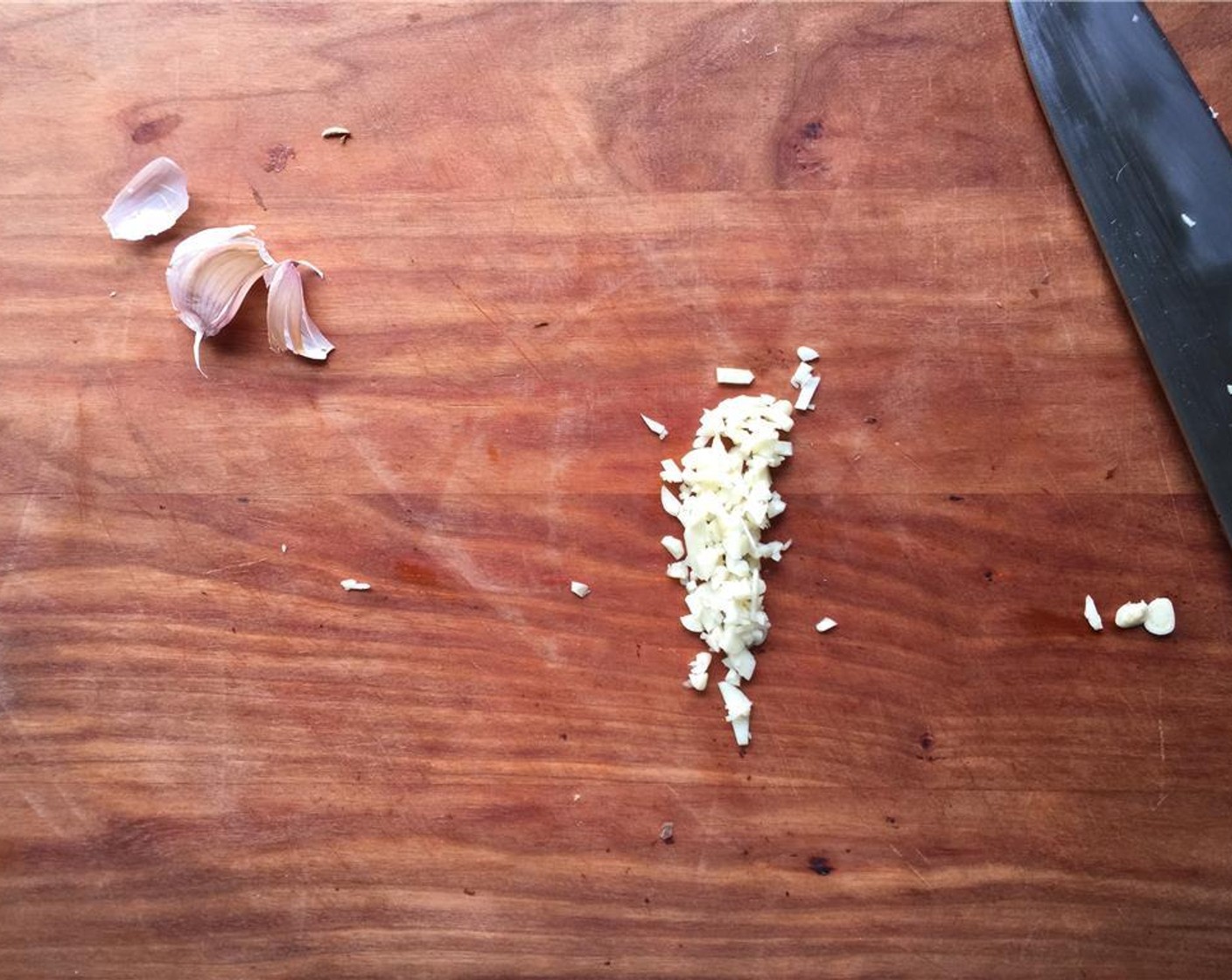 step 7 Finely chop the Garlic (3 cloves). Set aside.