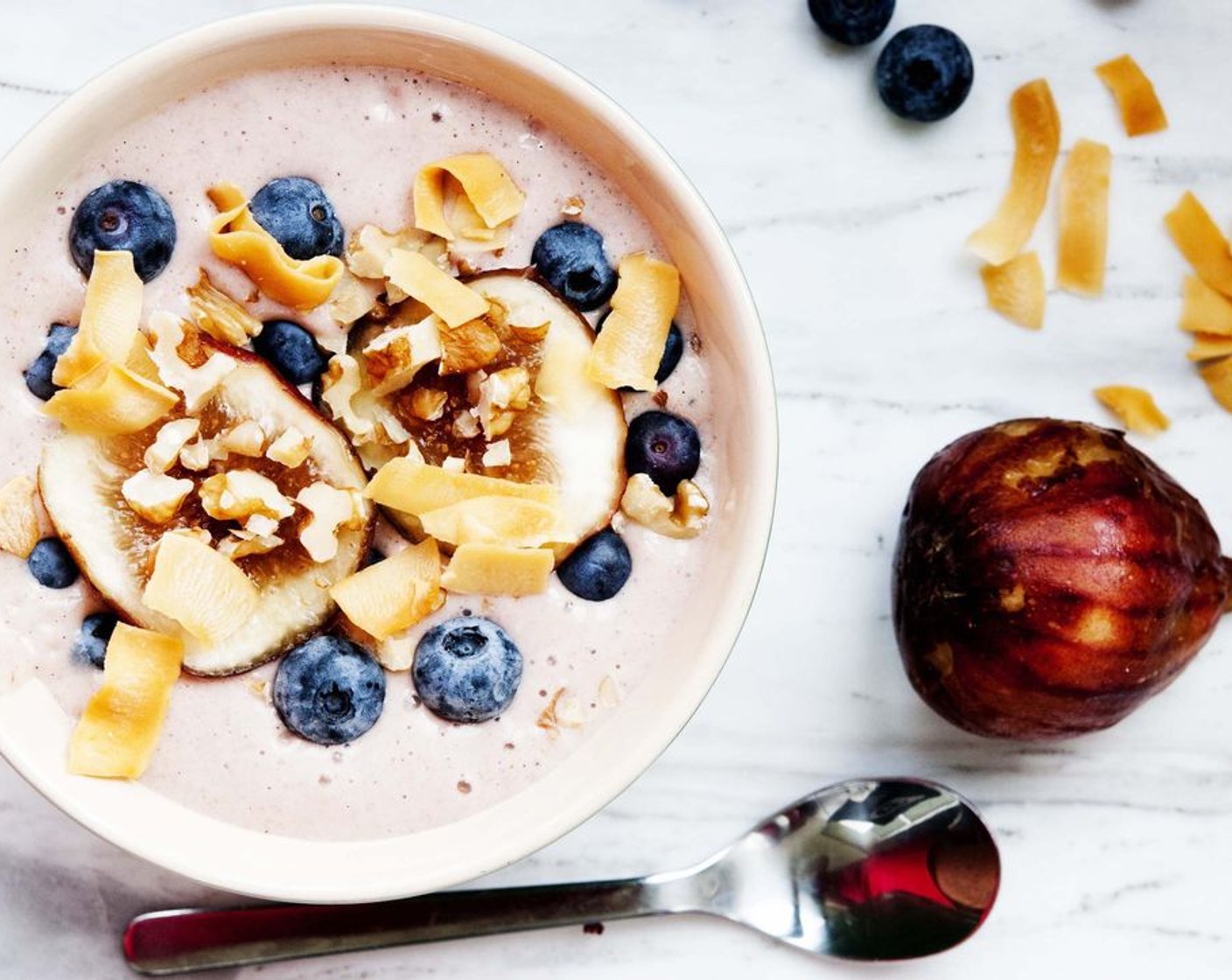 step 4 Transfer to a bowl and top it off with Fresh Blueberry (1/4 cup), sliced fig, and Coconut Chips (2 Tbsp).