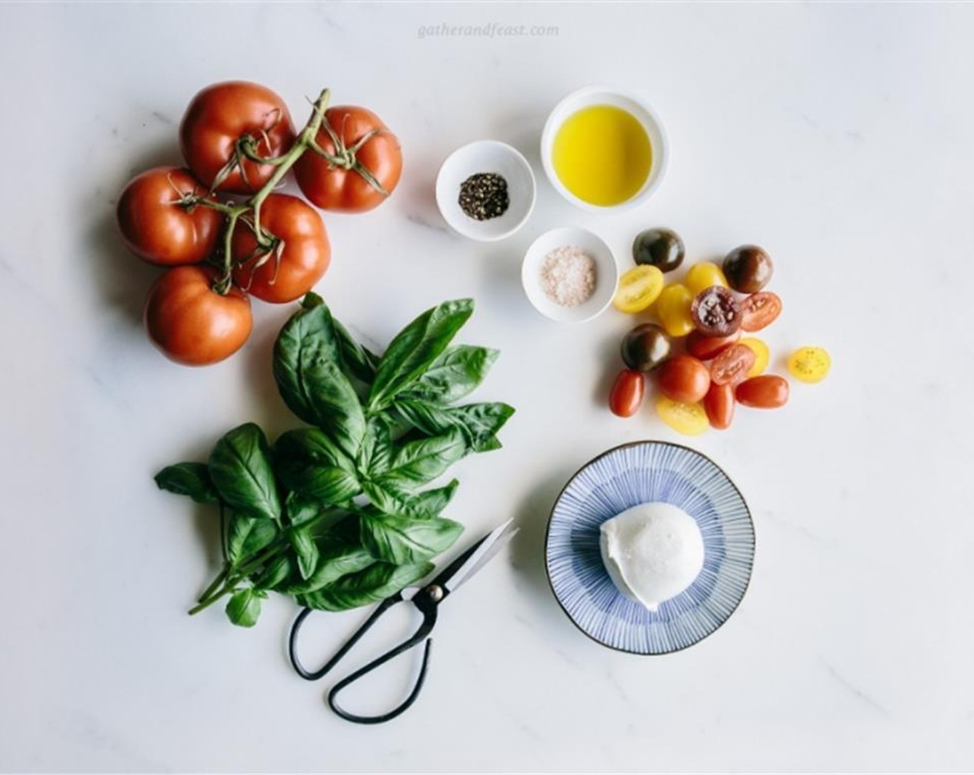 step 1 Slice the Truss Tomatoes (3) and place them on a serving plate. Next, chop the Cherry Tomatoes (1 1/3 cups) in half and add them around the medium tomatoes.