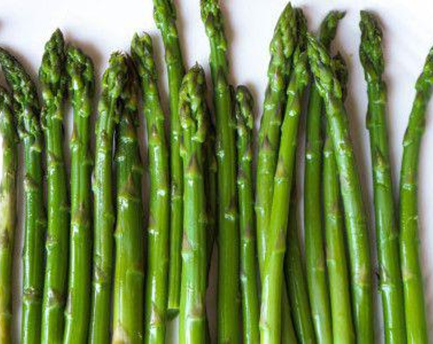 step 3 Add the asparagus to the boiling water and cook until al dente and bright green, about 2-3 minutes. Immediately transfer to the ice-water to shock. Remove and set aside until needed.