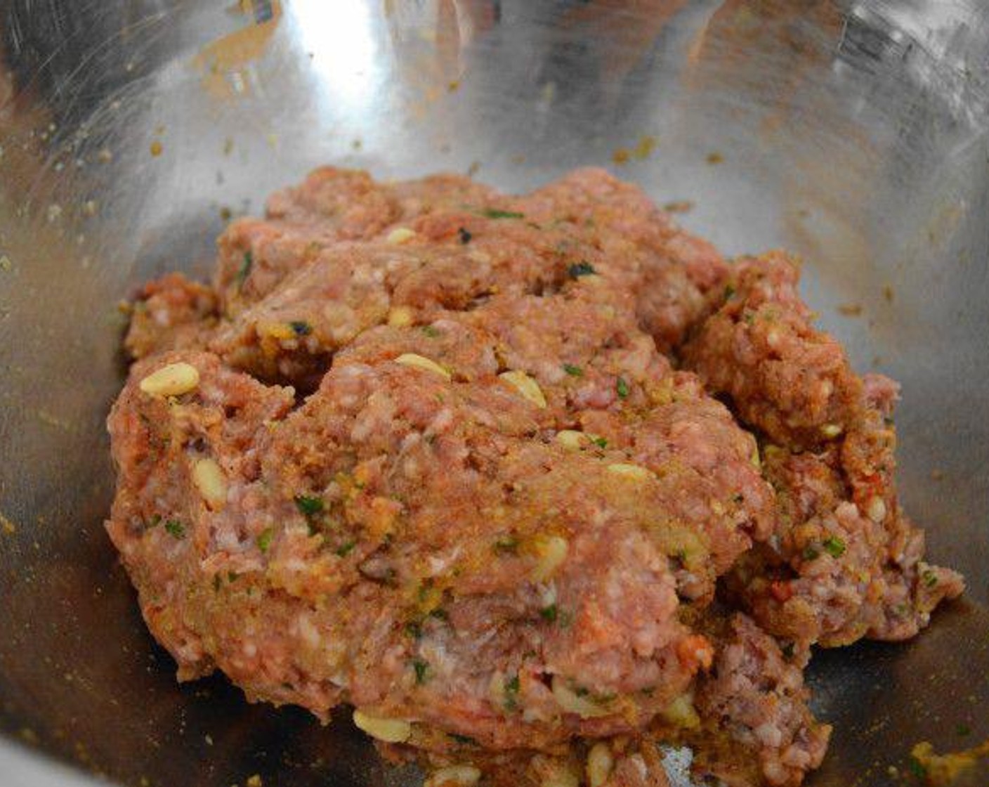 step 2 Combine Breadcrumbs (1/2 cup) Eggland's Best Classic Eggs (2), Pine Nuts (4 Tbsp), Fresh Mint (4 Tbsp), Salt (1 tsp), Simply Organic Cinnamon, Ground (1/2 tsp), Ground Nutmeg (1/2 tsp), Ground Coriander (1/2 tsp), Ground Cumin (1/2 tsp), Smoked Paprika (1/2 tsp), Cayenne Pepper (1/8 tsp), and Saffron Threads (1 pinch) in a large bowl. Stir them together, then add in the Ground Lamb (1 lb).