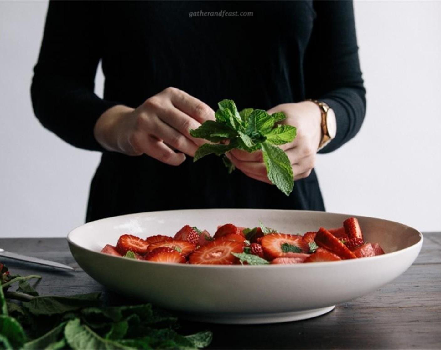 step 3 Place the chopped watermelon and sliced strawberries into a medium sized serving bowl. Sprinkle with chopped pistachios and slightly torn Fresh Mint Leaves (4 sprigs).