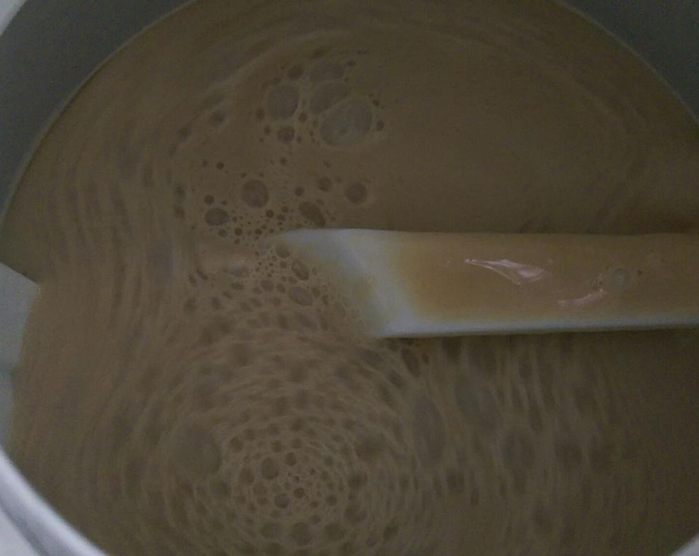 step 7 Place custard into ice cream maker and churn.