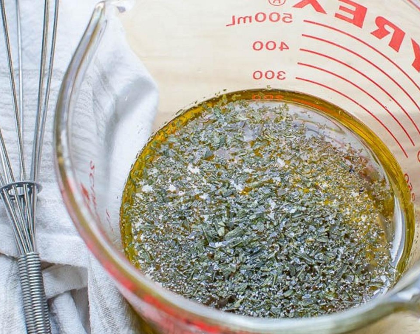 step 5 Mix Garlic (2 cloves), Whole Grain Dijon Mustard (1 Tbsp), Dijon Mustard (1 tsp), Champagne Vinegar (4 Tbsp), Chardonnay (2 Tbsp), Honey (1 tsp), Dried Tarragon (1 tsp) Kosher Salt (1/2 tsp), and Ground Black Pepper (1/4 tsp).