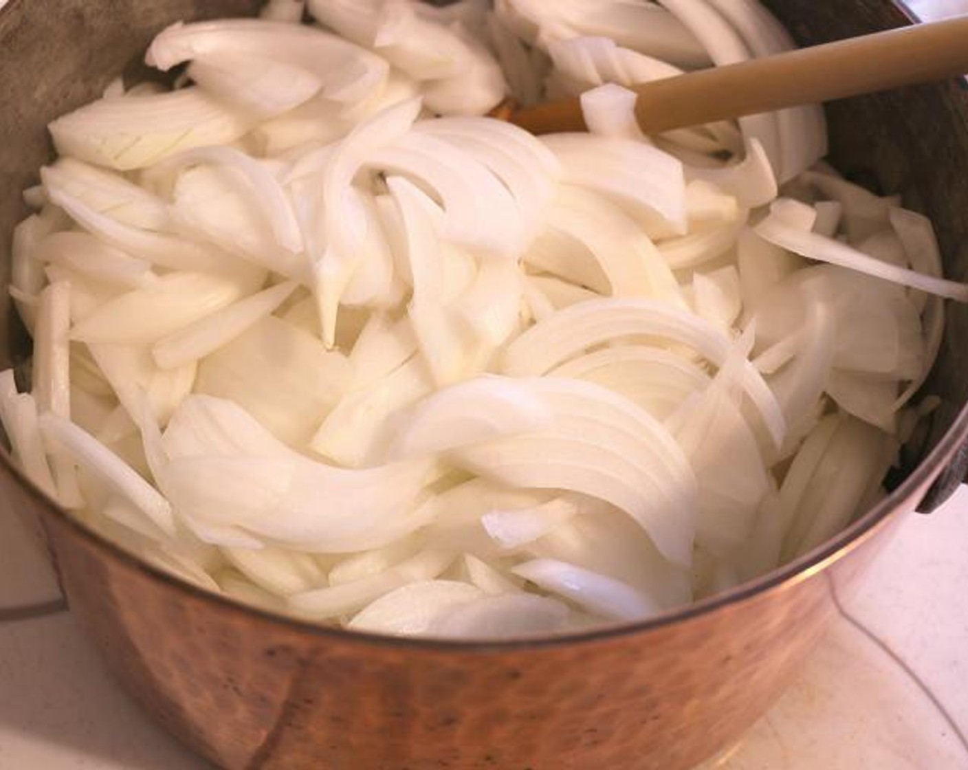 step 2 Add sliced Onions (21 cups).