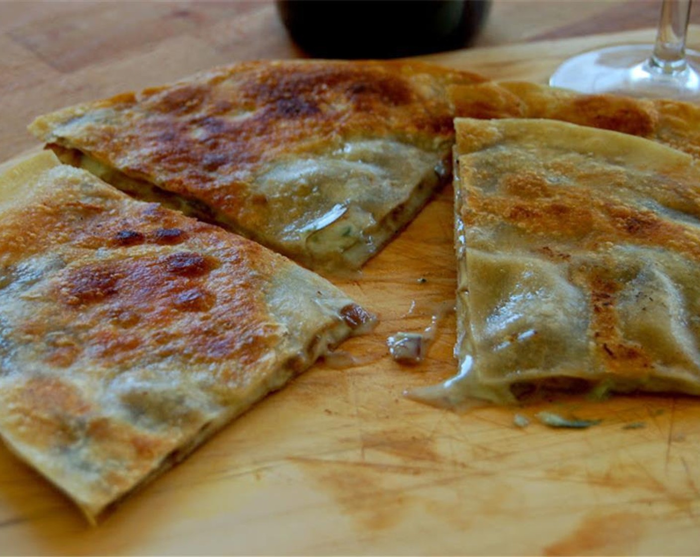 step 3 Remove from pan.  Use a pizza cutter or large knife to cut into quarters.  Enjoy with a nice glass of wine.