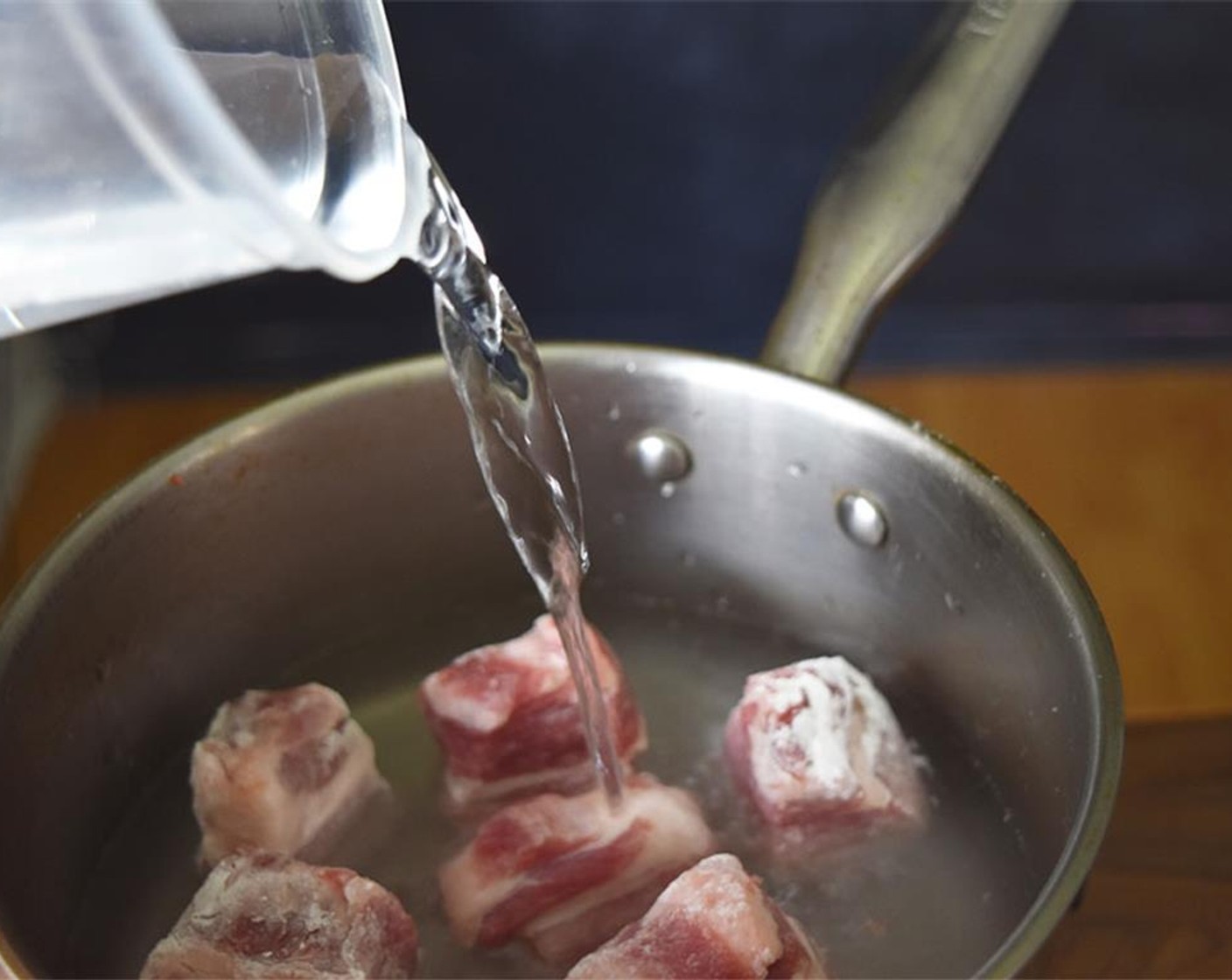 step 12 Place pieces skin side down in a saucepan. Pour in Water (2 1/2 cups) with Salt (1/2 tsp). Cook over medium low heat. Simmer until all the water evaporates, for about 1 hour.