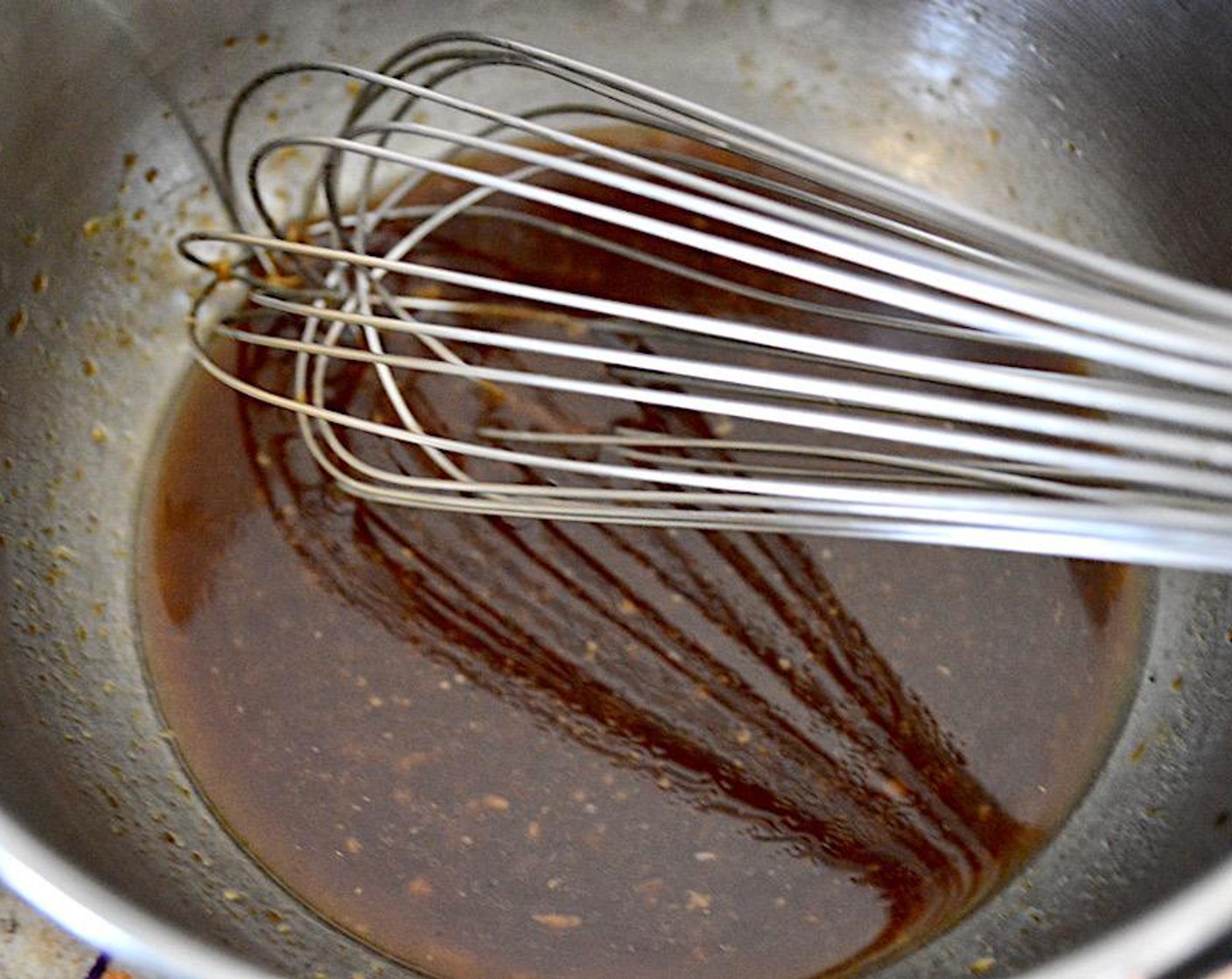 step 3 In another bowl whisk the Low-Sodium Soy Sauce (1/2 cup), Sesame Oil (1/4 cup), Olive Oil (1/4 cup), Worcestershire Sauce (1 dash), Fresh Ginger (1 Tbsp), Garlic (1 clove), Creamy Peanut Butter (1/2 tsp) and Chinese Five Spice Powder (1/4 tsp) together thoroughly.